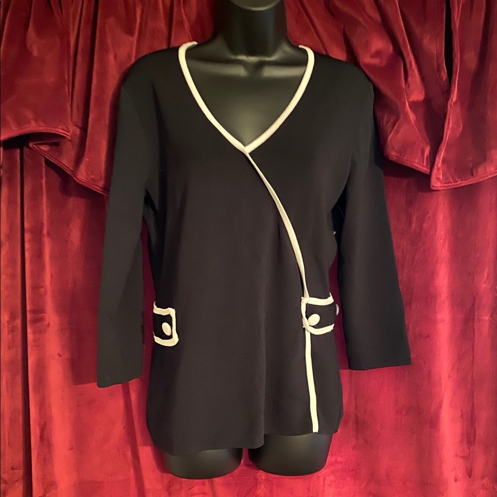 Black long sleeves shirt .